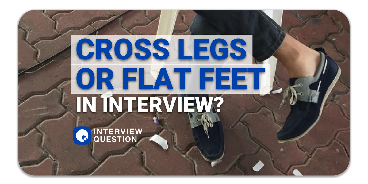 Cross legs or feet flat on the floor in an interview waiting room?